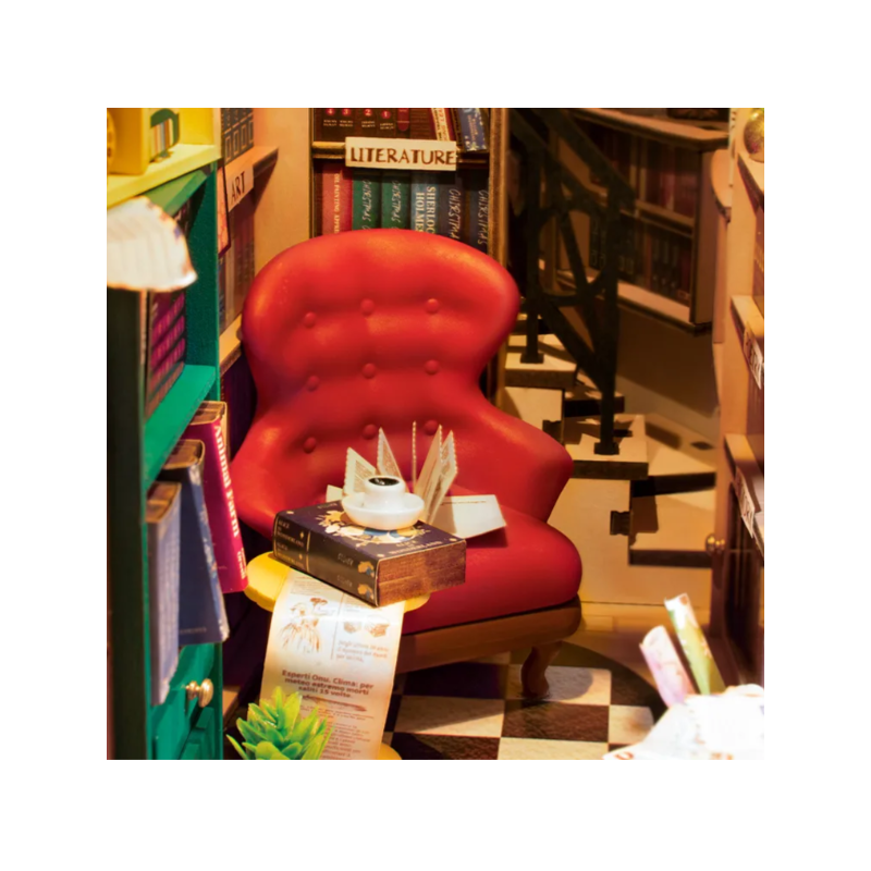 Chaise et livres de la maquette bibliotheque Rolife