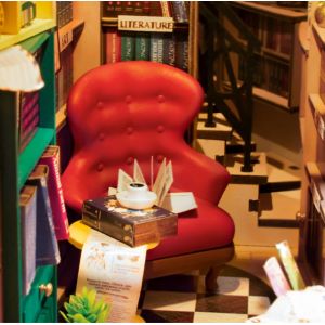 Chaise et livres de la maquette bibliotheque Rolife
