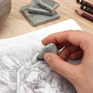 Accessoires pour dessin : gommes, taille-crayons, règles, pochette